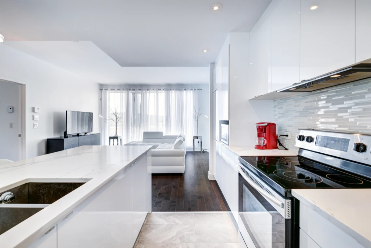 unir cocina y comedor - reforma integral en Barcelona - tirar tabique de la cocina y para crear ambiente familiar y de comunica